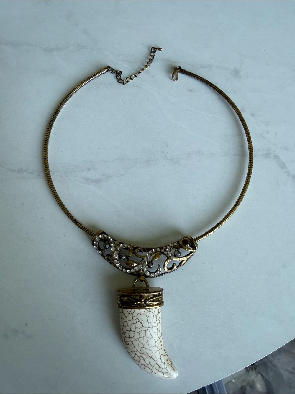 Gold-Tone Necklace with White Crackle Horn Pendant